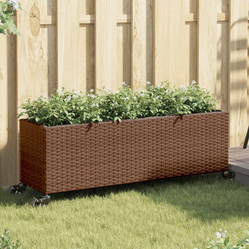 Afbeelding laden in galerijviewer, Vidaxl plantenbak met wielen 3 potten 107x32x38 cm poly rattan bruin