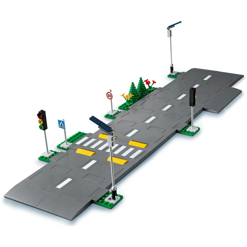 Afbeelding laden in galerijviewer, Lego ® city wegplaten 60304 bouwset; bouwbare speelgoedweg; maak de wegplaten vast aan je stad om deze uit te breiden; met lantaarnpalen, stoplichten, verkeersborden, bomen en planten, verkeersdrempels en een zebrapad (112 onderdelen)