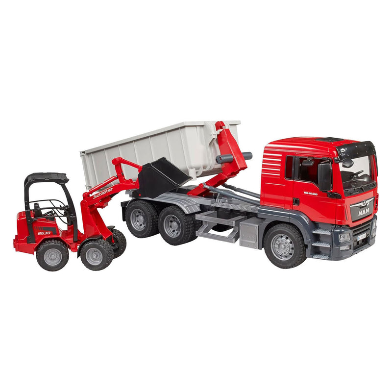 Afbeelding laden in galerijviewer, Bruder , miniatuurauto van de man tgs vrachtwagen met container, rood
