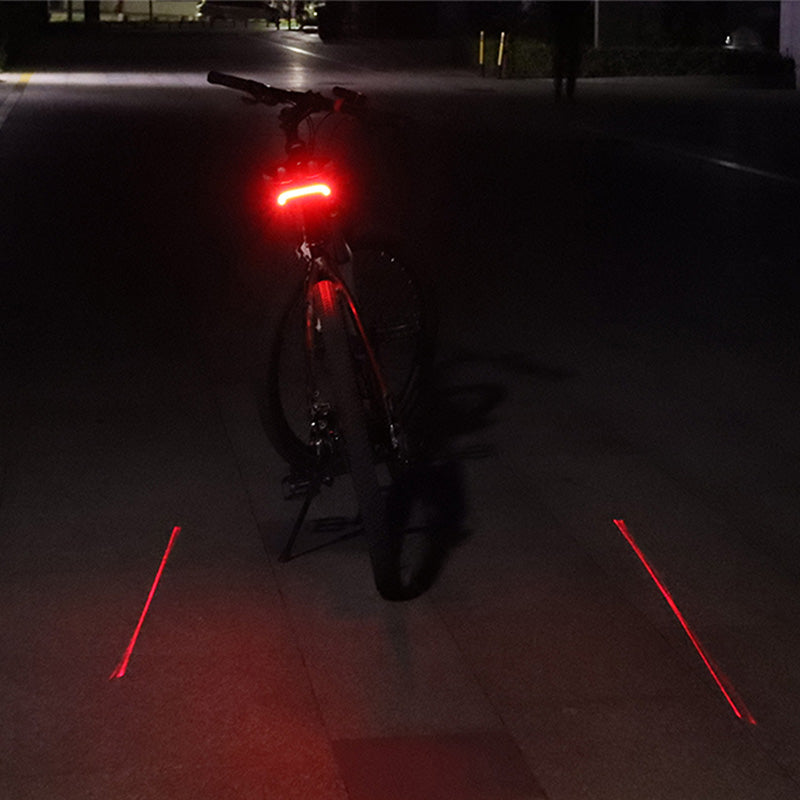 Afbeelding laden in galerijviewer, Meilan Laser achterlicht met afstandbediening USB Cute Eye
