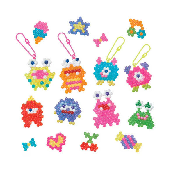 Afbeelding laden in galerijviewer, Aquabeads neon gekke monsters set- kleurrijke parels die magisch aan elkaar plakken door water
