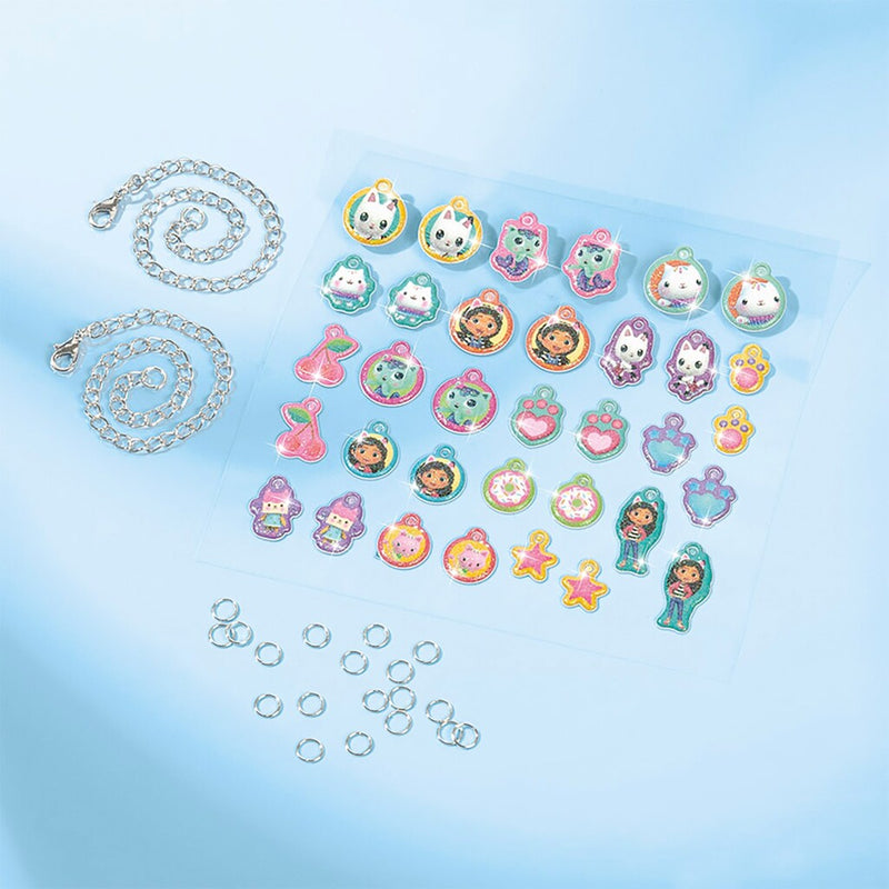 Afbeelding laden in galerijviewer, Totum gabby’s poppenhuis knutselset 2 in 1 glitter bedelarmbandjes maken blaaspennen en sjablonen gabby’s dollhouse creatief speelgoed meisjes cadeau tip
