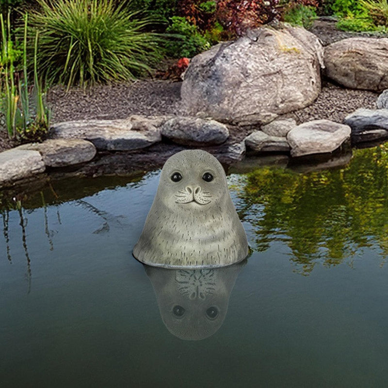 Afbeelding laden in galerijviewer, Countryfield zeehond siebert grijs polystone drijvend 14,5x13,5x13,5cm
