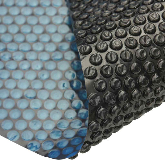 Vidaxl zwembadfolie solar drijvend 527 cm pe zwart en blauw