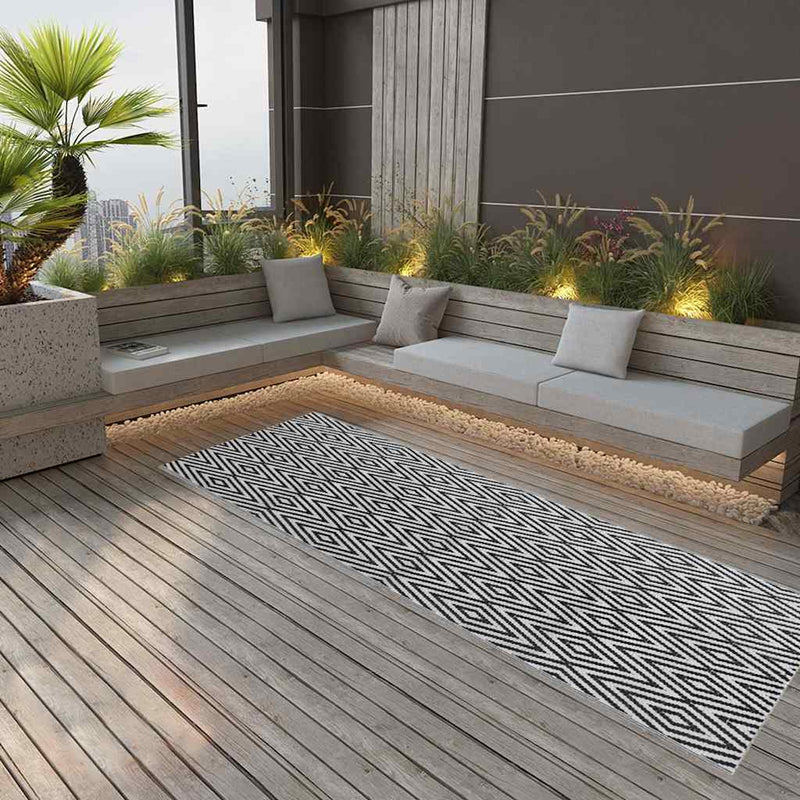 Afbeelding laden in galerijviewer, Vidaxl buitenkleed arakil 80x250 cm polypropeen zwart
