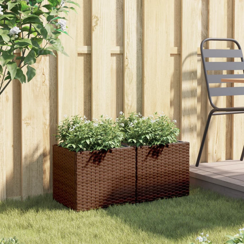 Afbeelding laden in galerijviewer, Vidaxl plantenbakken 2 st 36x30x32 cm poly rattan bruin
