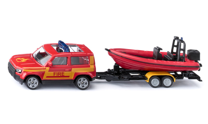 Afbeelding laden in galerijviewer, Siku brandweerwagen land rover defender met reddingsboot
