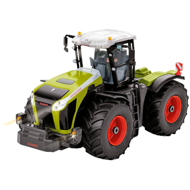 Afbeelding laden in galerijviewer, Siku control - claas xerion 5000 tracvc jubileummodel 25 jaar claas xerion rc (schaal 1:32)
